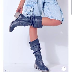 Free people essential tall slouch boot in rinsed navy